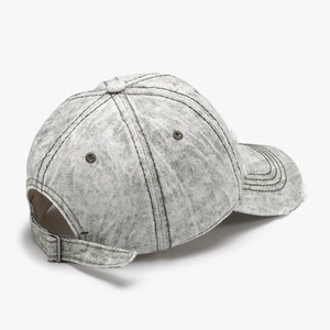 Distressed grey washed denim baseball cap with vintage worn edges and adjustable metal strap