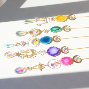 Five crystal suncatchers with natural agate slices and gold metal moon star accents