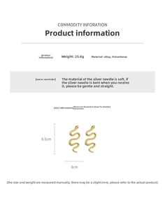 Detailed view of gold snake earrings with rhinestone inlay, dimensions 8.5cm by 3cm