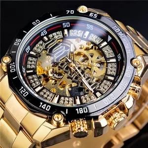 Macro shot of gold mechanical watch gears and skeleton dial with tachymeter scale
