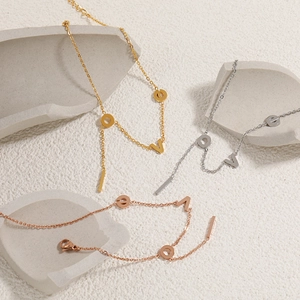 Minimalist LOVE letter anklets in gold, silver, and rose gold finish stainless steel