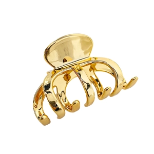 Elegant gold metal hair claw clip with multi-tooth design for thick hair styling