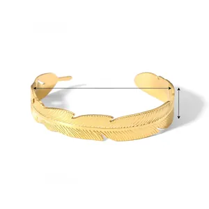 Detailed specs of the gold feather cuff bracelet with 63mm diameter and 12.9mm width