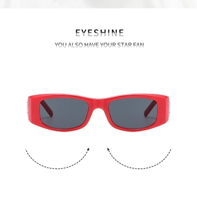 Close-up of rose red rectangular kids sunglasses with deep gray lenses and glossy finish