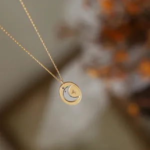 Minimalist 18K gold plated celestial oval pendant necklace with moon and star