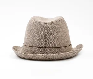 Rear view detail of light brown woven fedora hat with a dark brown leatherette band