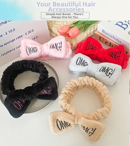 Detail of plush OMG! bow headbands in five colors for face washing and skincare routines