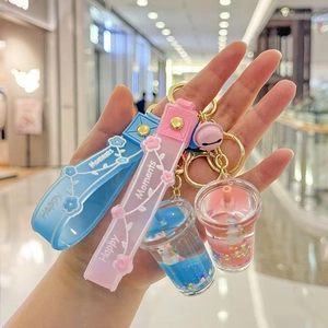 Cute unicorn milk tea cup keychain with liquid glitter flow and silicone strap