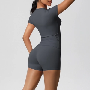 Close-up back view of dark grey seamless high-elasticity yoga shorts and top set