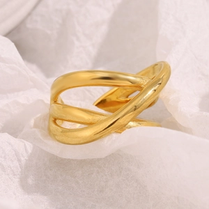 Close-up of 18K gold-plated stainless steel ring with elegant crisscross multi-layer lines