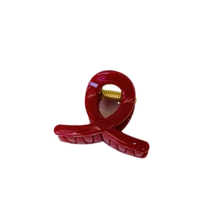Polished dark red acrylic hair claw clip with gold spring for women hair styling
