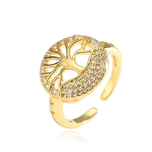 Golden Tree of Life open ring with white zircon stones on a white background