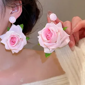 Elegant 3D fabric rose drop earrings with pink gradient petals and green leaf details