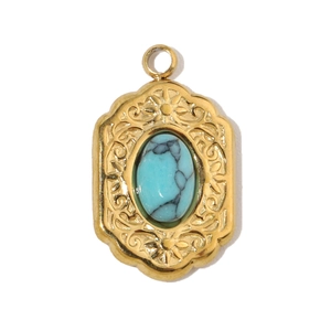 Detail of vintage gold oval pendant featuring sky blue textured natural stone inlay