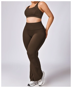 Detail of coffee brown high-waist flared yoga pants and racerback sports bra set