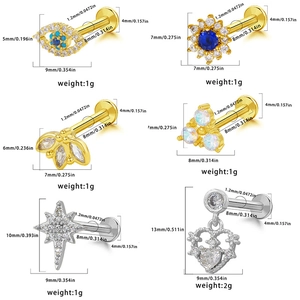 Detailed size guide for various steel lip rings featuring zircon and opal designs