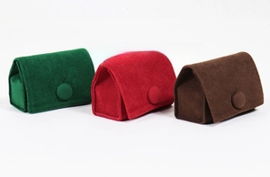 Three-fold soft velvet jewelry snap pouches in dark green, red, and dark brown colors