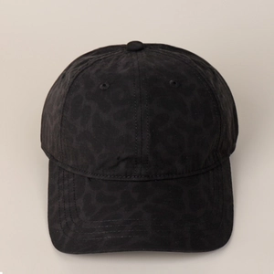 Detailed top view of black leopard print baseball cap with subtle glossy finish
