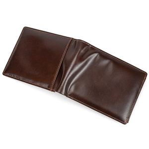 Detail shot of deep brown genuine leather wallet texture and precision stitching craft
