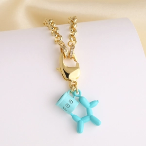 Collier gourmette plaqué or 18k avec pendentif chien ballon bleu et tasse à café