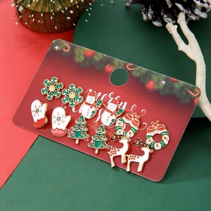 Close-up of 6-pair Christmas stud earrings set with snowflake, reindeer, and tree designs