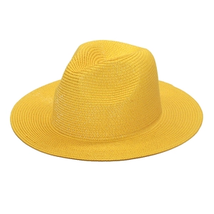 Bright yellow woven straw sun hat for summer beach vacations and stylish parent-child wear