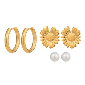 Three-pair earring set featuring gold hoops, sunflower studs, and classic white pearls