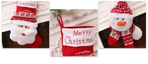 Detail view of plush Christmas stockings with 3D Santa and Snowman dolls on fireplace