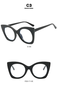 Cat eye blue light blocking glasses with oversized black frames in front and side views