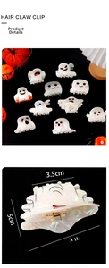 Detailed view of white ghost hair claw clip with pearlescent finish and spooky expression