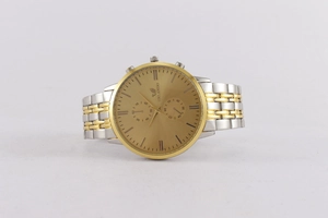 Detailed macro view of the ORLANDO watch with two-tone gold band and champagne dial