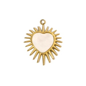 Detailed view of a golden heart pendant with a white shell inlay and radiant sunburst edges