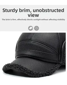Detail of sturdy brim and plush fleece lining on a men's winter leather baseball cap