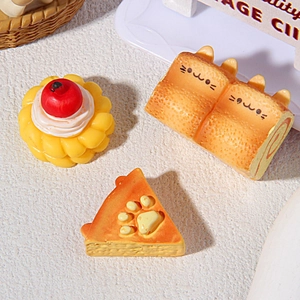 Detailed view of resin miniature cat toast, cake and pastry charms for DIY crafts
