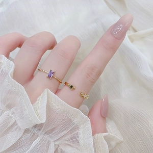 Elegant gold-plated amethyst rings set with rectangular purple gem and heart details