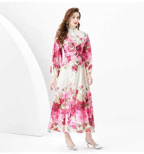 Detail of vintage floral print maxi dress featuring stand collar and button-down front