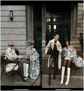 Detail shot of mid-length leopard print and beige faux fox fur coats with plush texture
