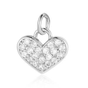 Macro shot of silver heart pendant featuring micro-pave clear cubic zirconia stones