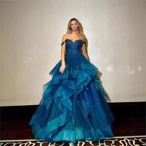 Elegant navy blue strapless evening gown with floral lace embroidery and tiered mesh skirt