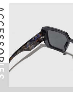 Detail view of square sunglasses with model 95409 C3 and tortoiseshell temple design