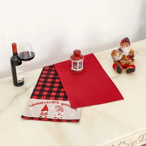 Christmas table runner with red buffalo plaid, gnomes and Merry Christmas script decor