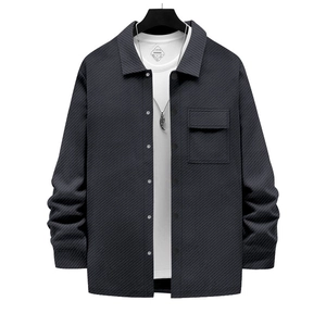 Close-up of textured knit lapel jacket with silver metal buttons and chest pocket