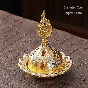 Close-up of golden Middle Eastern incense burner with hollow lid and 9.5cm height dimension