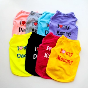Close-up of colorful pet tank tops showing varied colors and I Love My Mommy prints