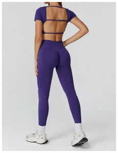 Rear view of purple seamless yoga set with hollow back top and high waist leggings