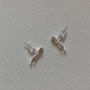 Minimalist 925 sterling silver bow knot stud earrings with clear silicone backs