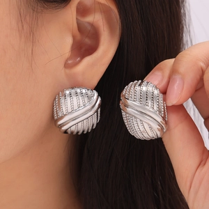 Vintage geometric oval stud earrings with multi-layered lines in polished titanium steel