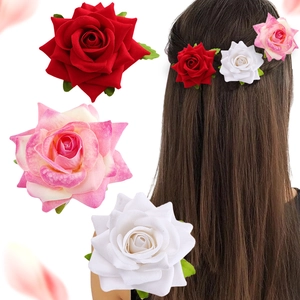 Three artificial rose hair clips in red, pink, and white shown with model styling