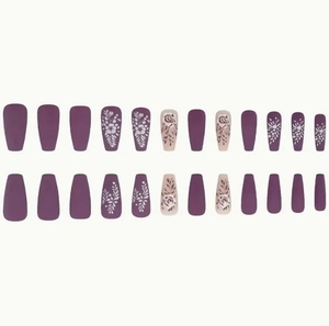 Detail of 24pcs long coffin false nails with purple floral patterns and matte finish