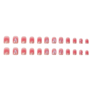 Pink gradient press-on nails with golden glitter and aurora shell design on white background